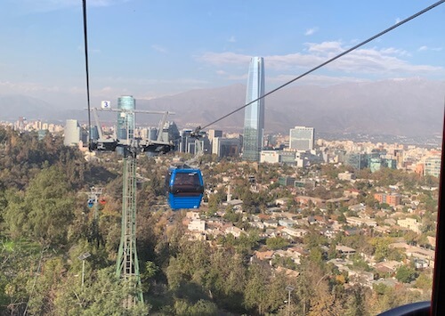A cable car goes up San Cristobal hill in the city